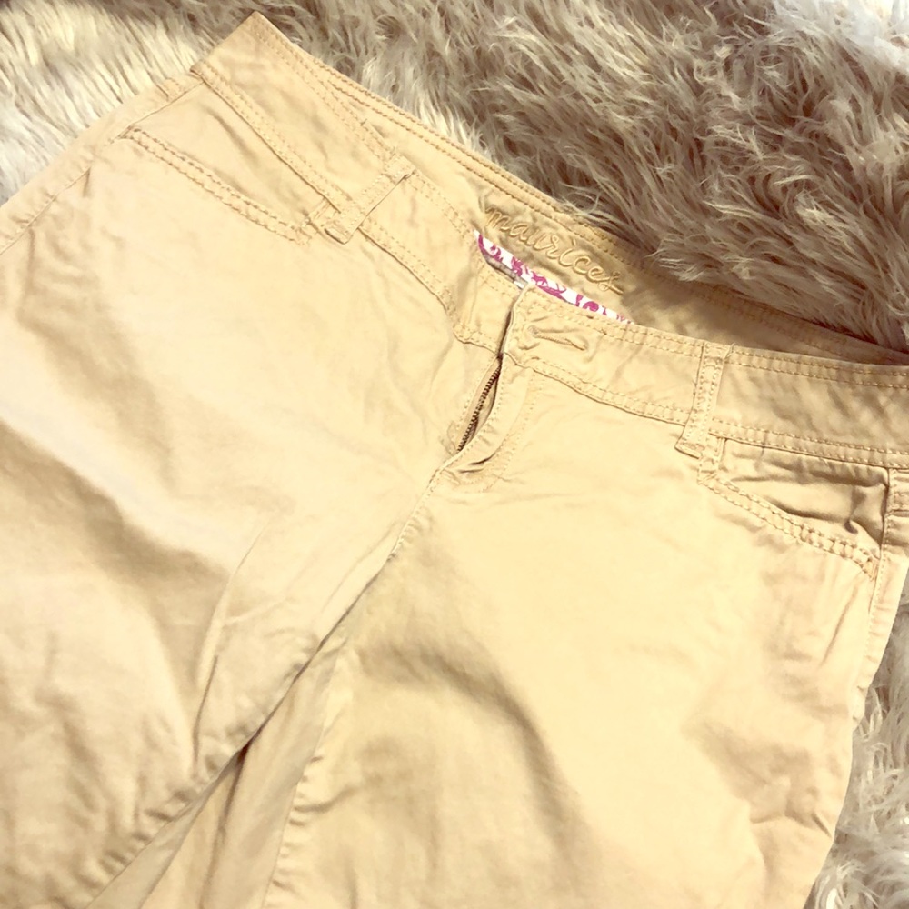 Khaki boot cut pants.